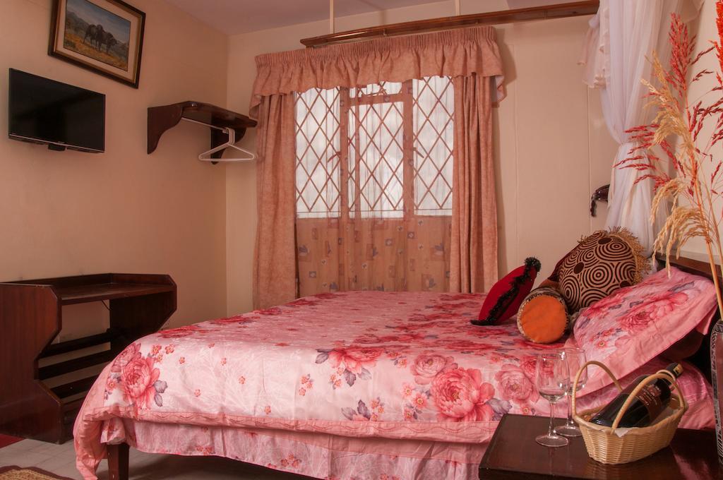 Blue Hut Hotel Найробі Номер фото
