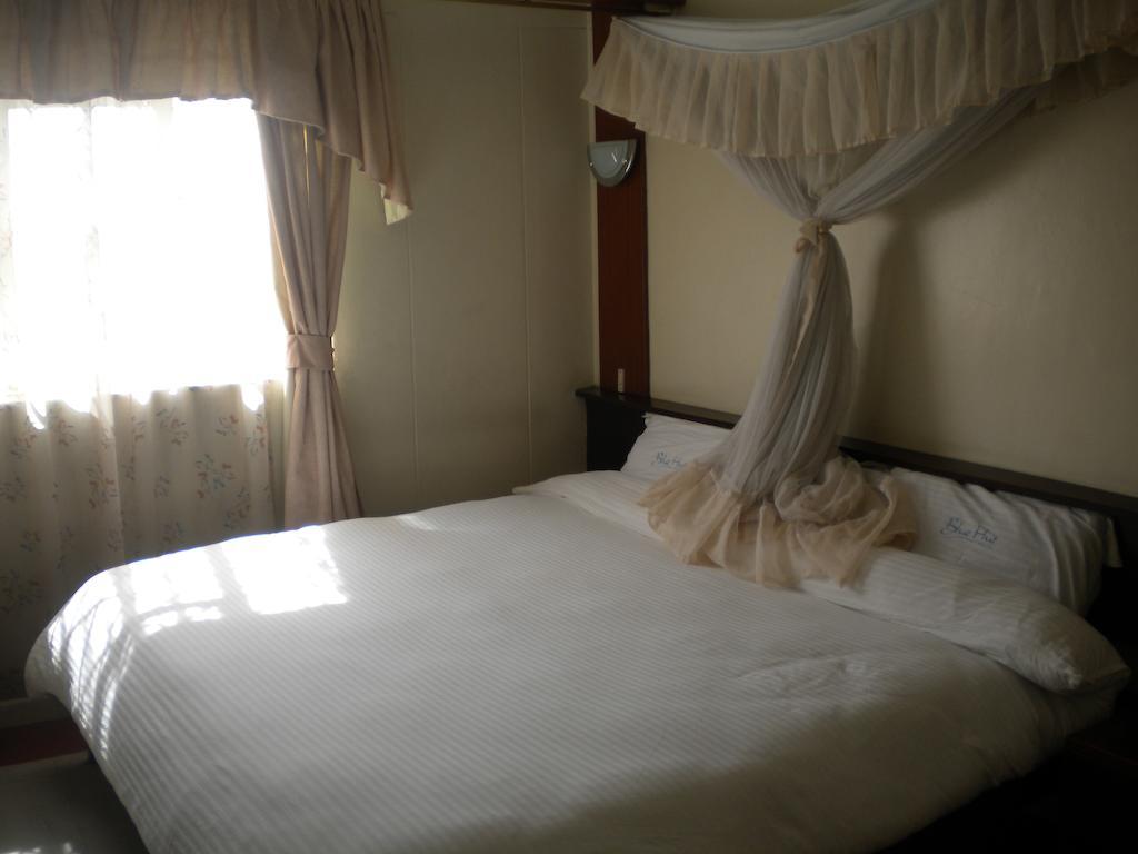 Blue Hut Hotel Найробі Номер фото